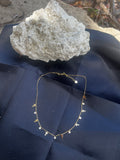 Collier, en petite croix du christ